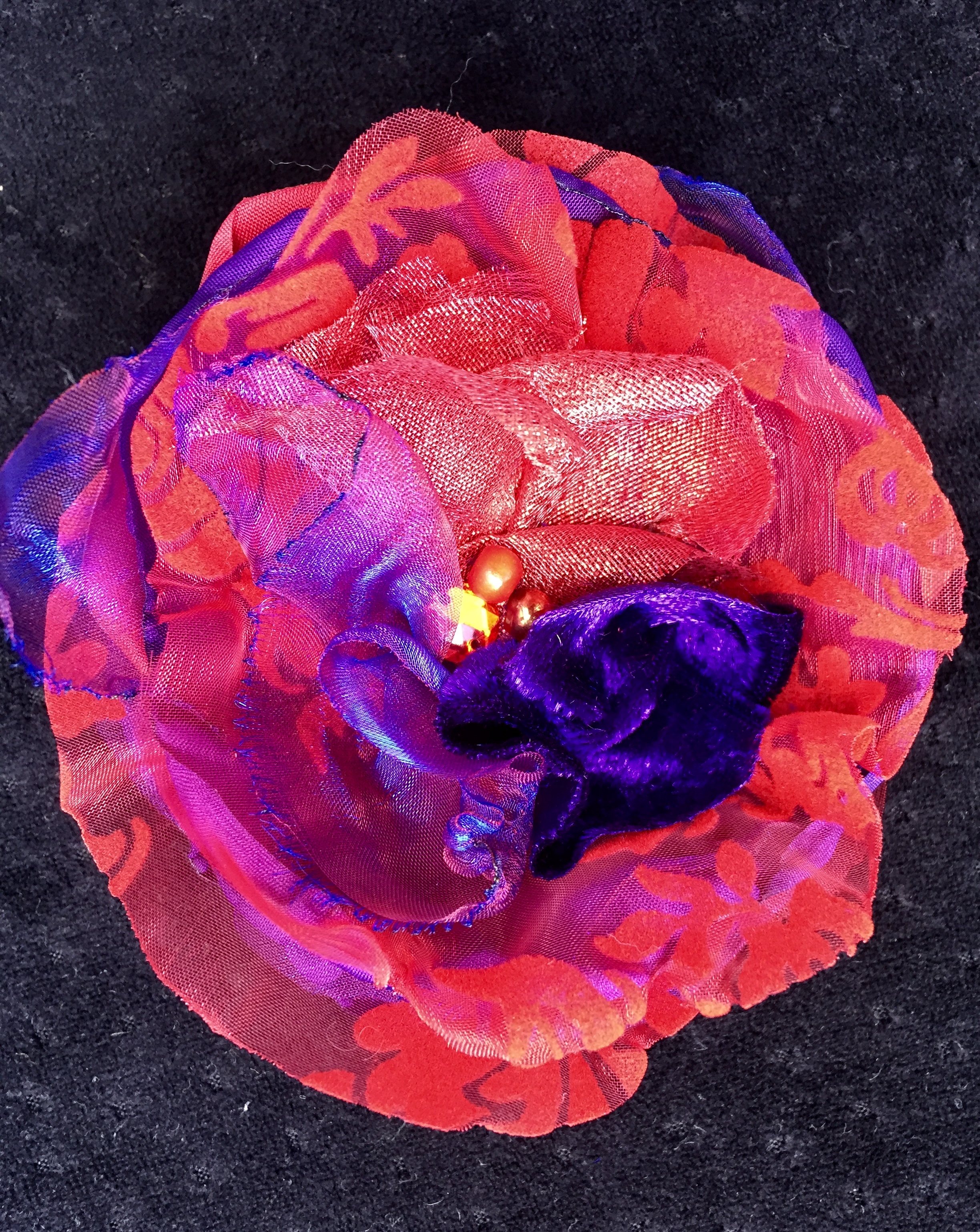 red and purple fabric flower corsage. Handmade