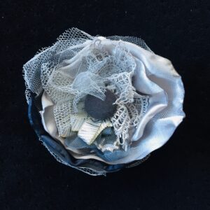 fabric corsage handmade using grey and silver tones
