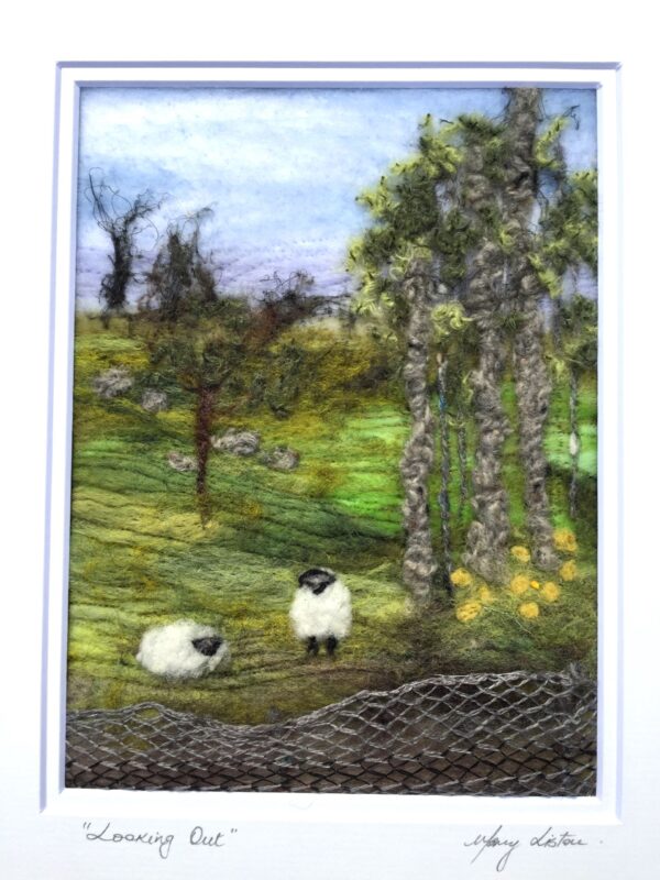 Spring in the fields with sheep under the trees.