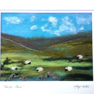Peaceful valley scene with sheep grazing
