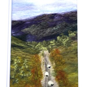sheep wandering along a country lane