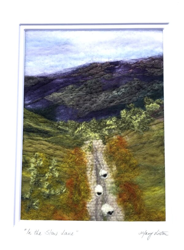 sheep wandering along a country lane